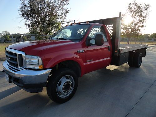 2004 ford f550  superduty w/12 ft flatbed in excellent condition