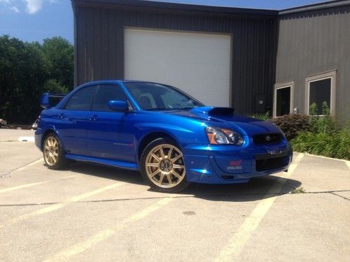 2005 sti blue w/ gold bbs only 16k original miles! excellent cond! hard to find!