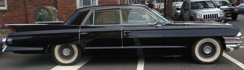 1961 cadillac fleetwood special 4 door black