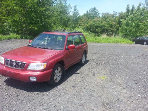 2002 red subaru forester s model