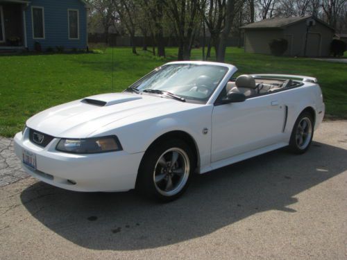 White gt convertible 4.6 l    5 speed manual 55,000 miles